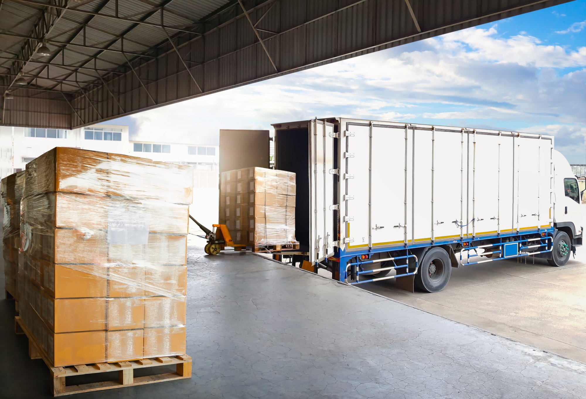 Image of loading a truck for shipment, symbolizing GearTrack's indoor, outdoor, and in-transit tracking capabilities.